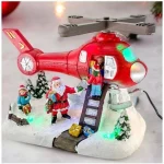 Χριστουγεννιάτικο Διακοσμητικό Άγιος Βασίλης με Ελικόπτερο, Φωτισμό & Μουσική 25.5x18x18cm